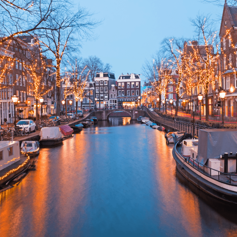 Amsterdam Guide holidays: Scenic view of Amsterdam canals with boats