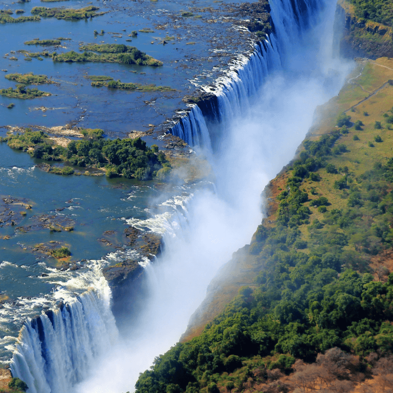 Aerial view of the Victoria Falls of the Zambezi River, border between Zambia (left side) and Zimbabwe (right side).